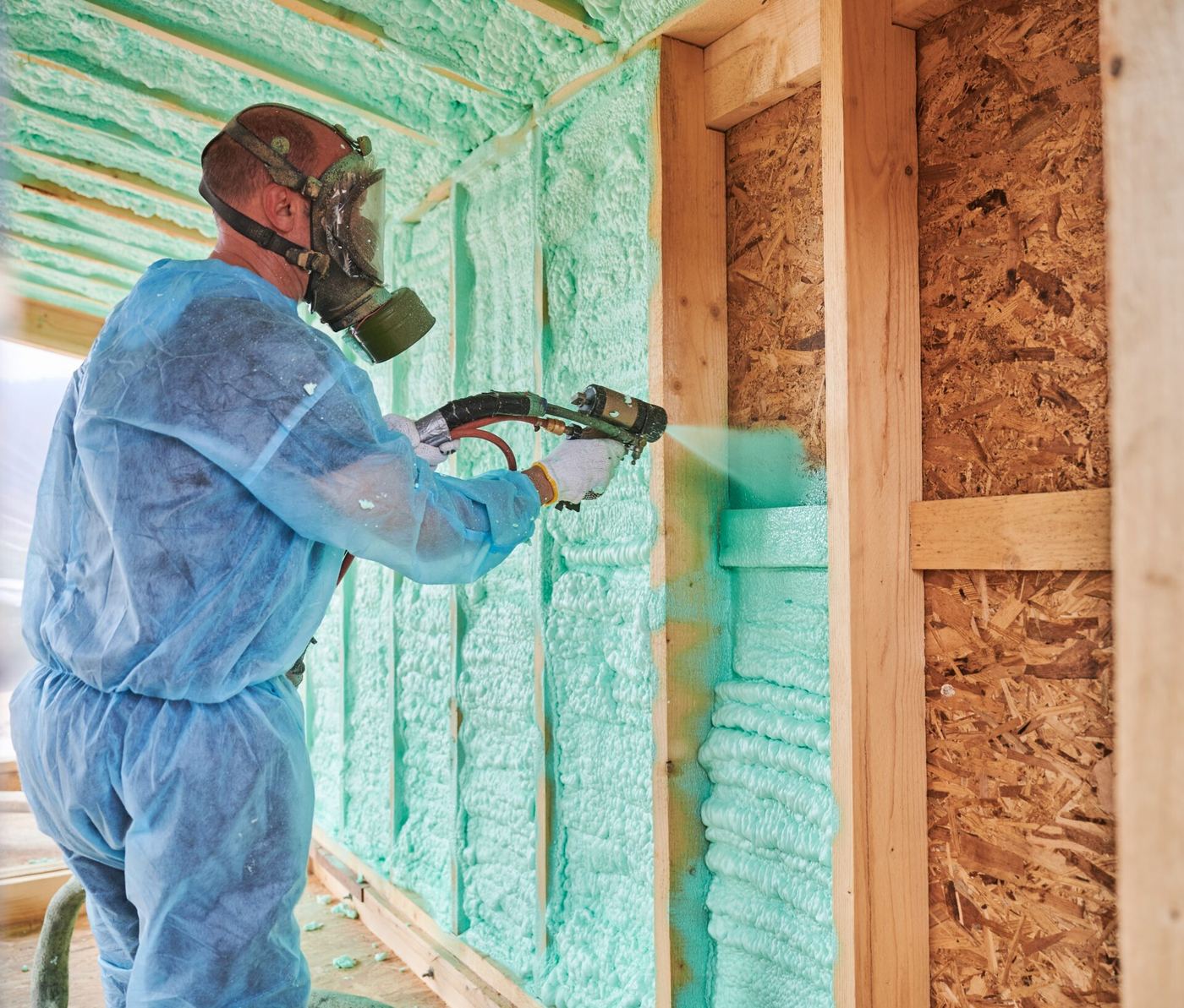 Closed-cell spray foam applied between wall studs